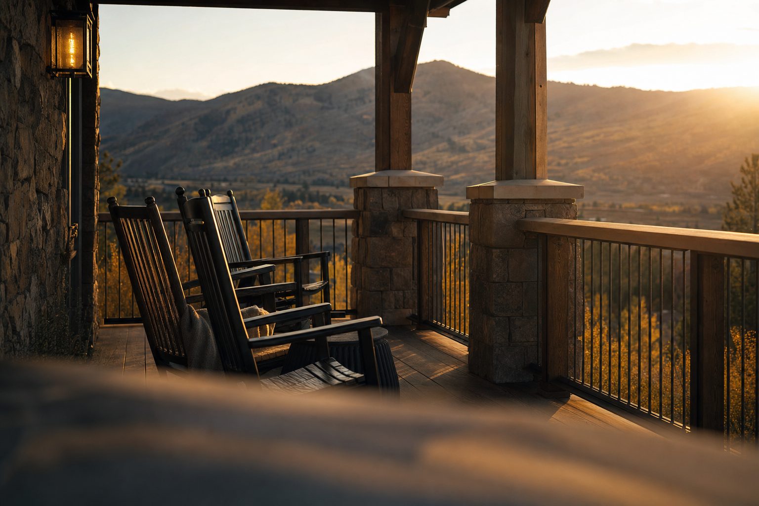 A Colorado mountain home porch in warm evening light